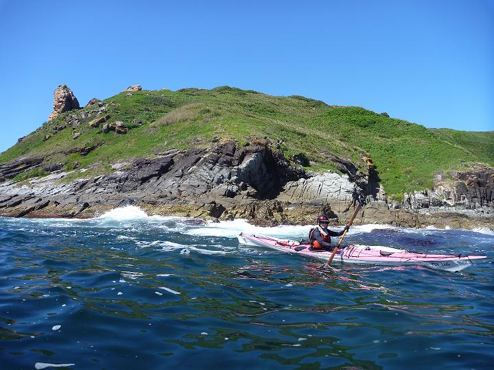 P1000257.JPG - Claudia with interesting rock pagodas off eastern Little Broughton Island (Photo by Matt)